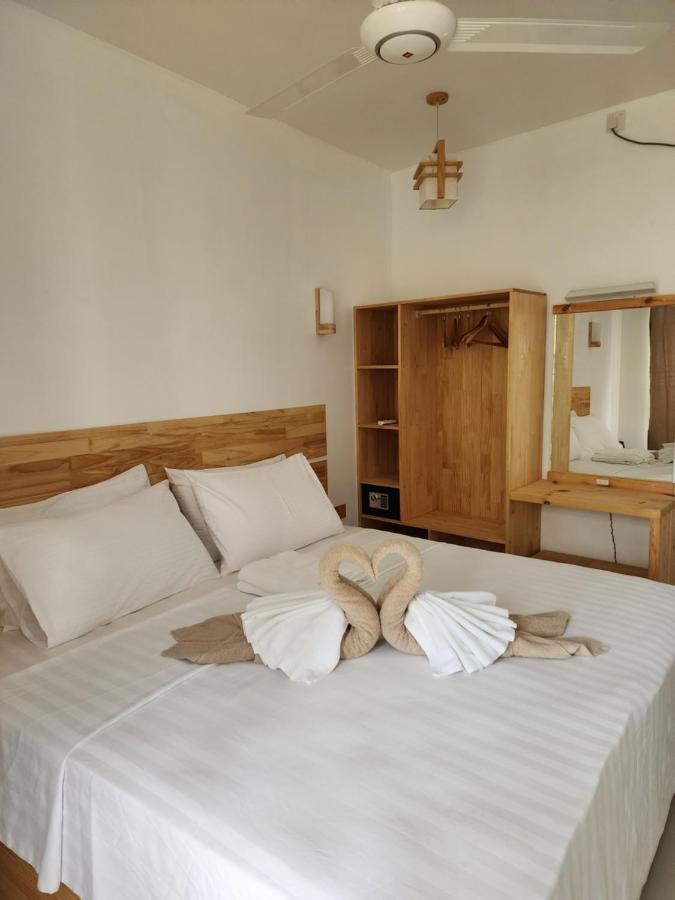 Отель Dhigurah Dhonveli Boutique Экстерьер фото